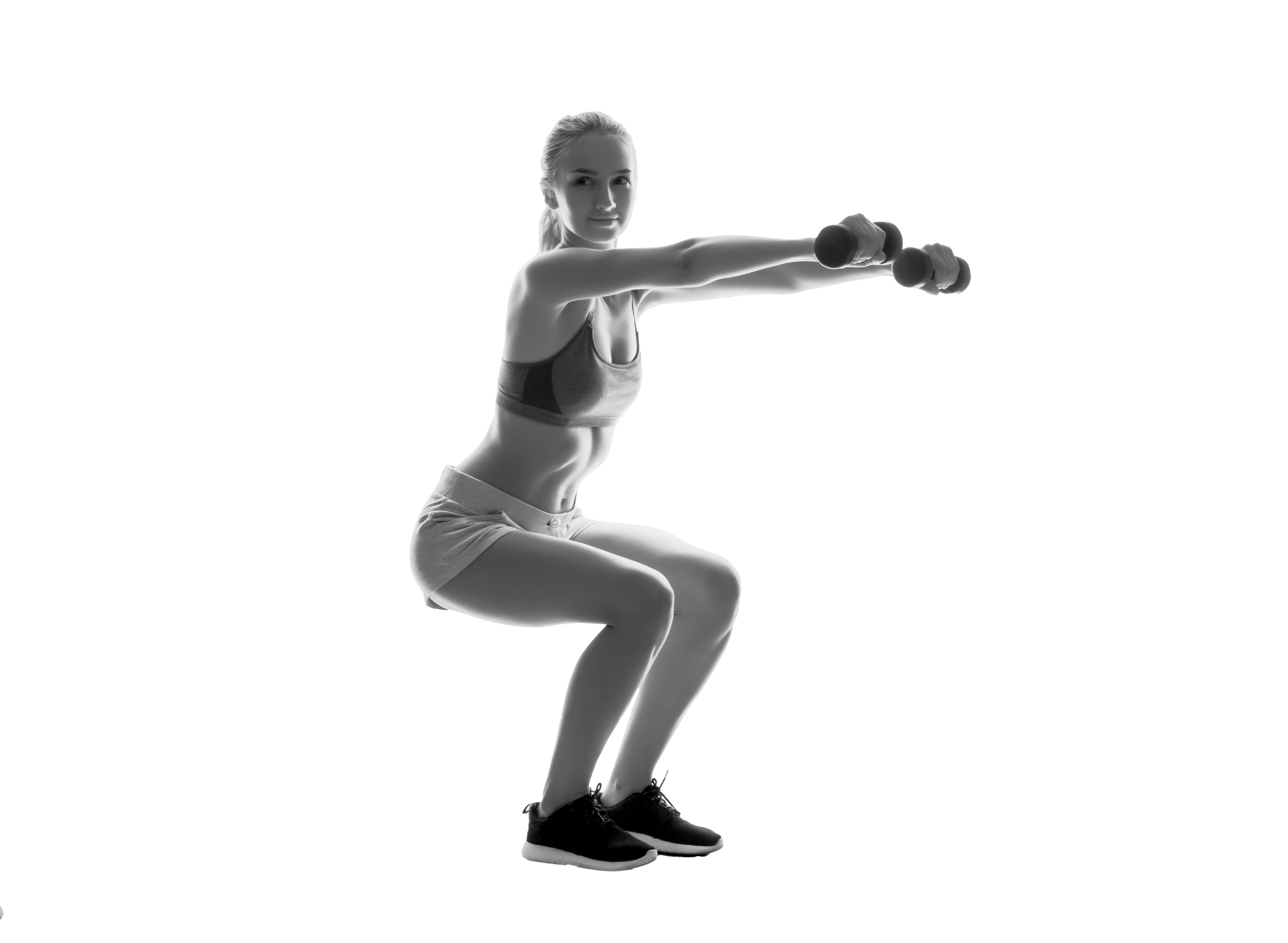 Mujer realizando un ejercicio dinámico de agilidad y resistencia en una sesión de Gac Train en el gimnasio Duplex de Andorra la Vella.