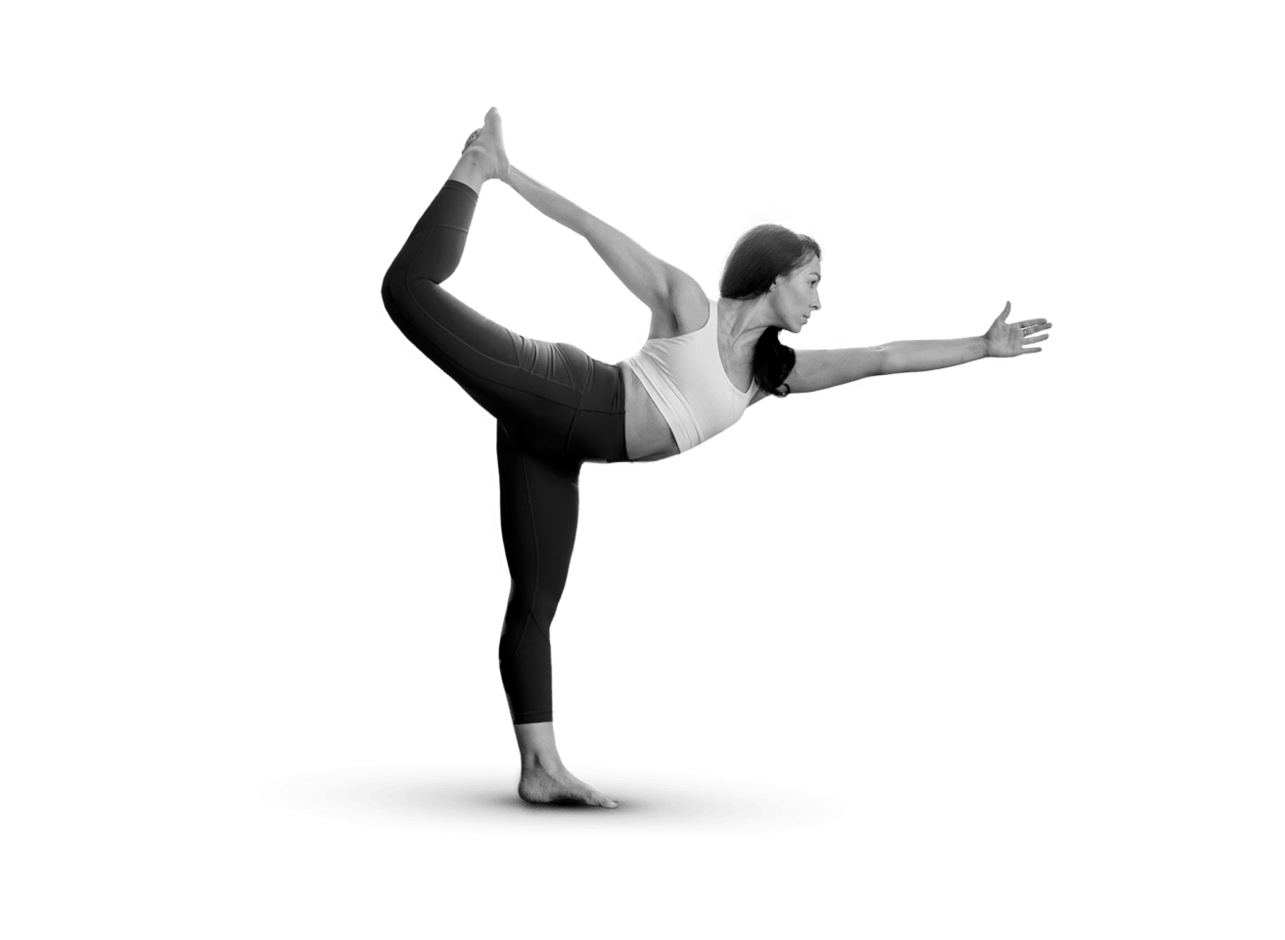 Mujer en plena sesión de yoga realizando una postura de flexibilidad y equilibrio en el gimnasio Duplex de Andorra la Vella.