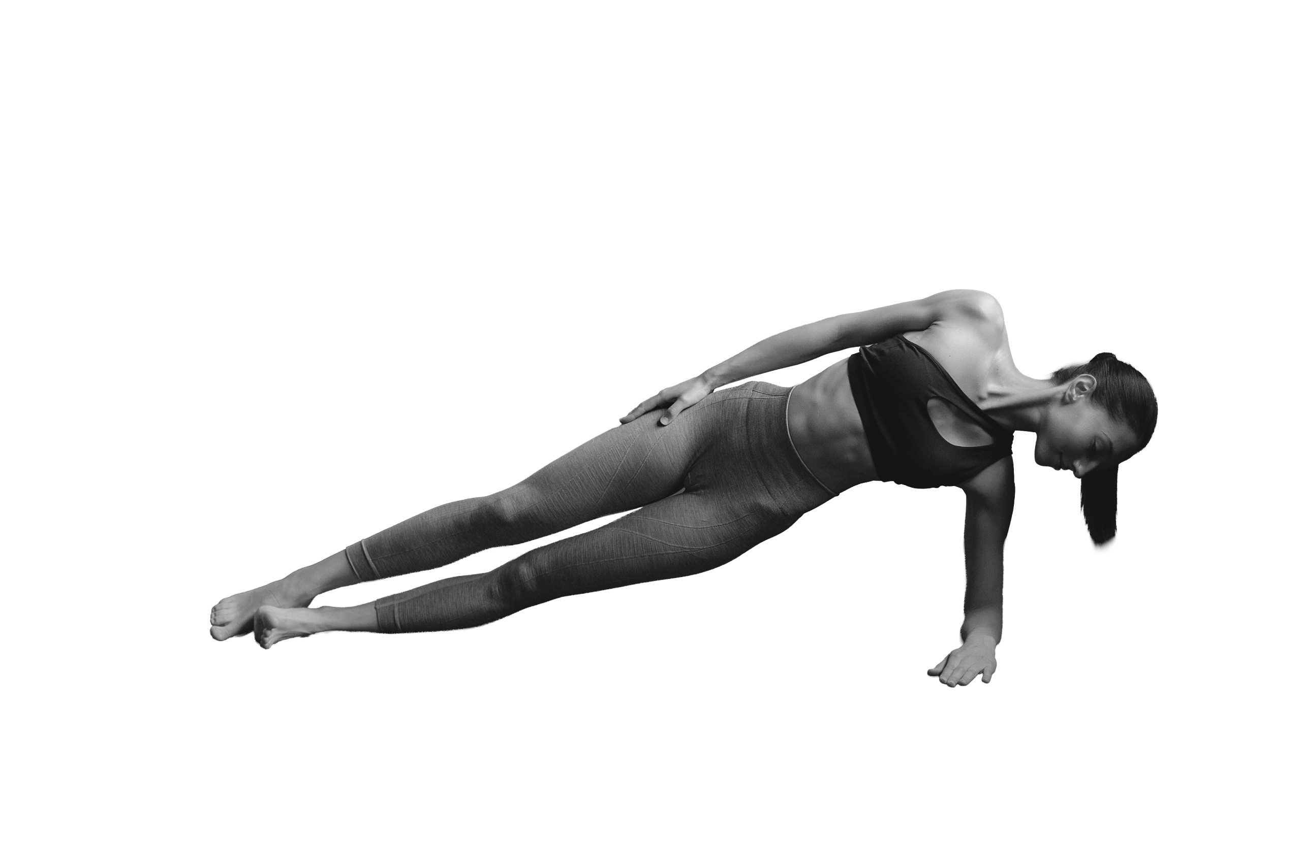 Mujer realizando un ejercicio de abdominales hipopresivos en el gimnasio Duplex en Andorra la Vella.